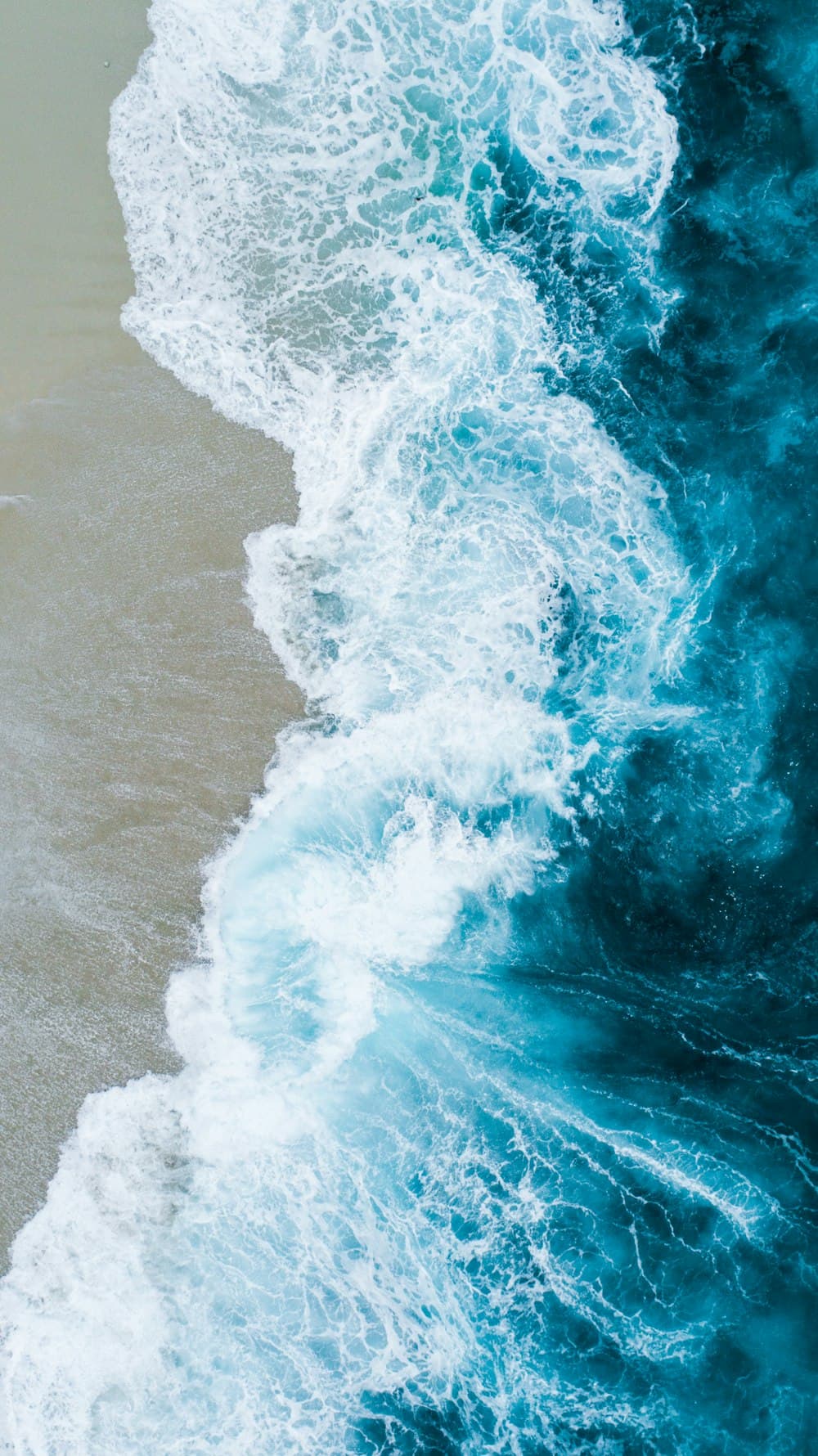Ocean waves meeting the shore
